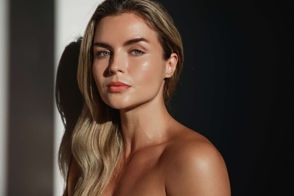 young woman blonde hair with rf microneedling aesthetic treatment in fairfax va